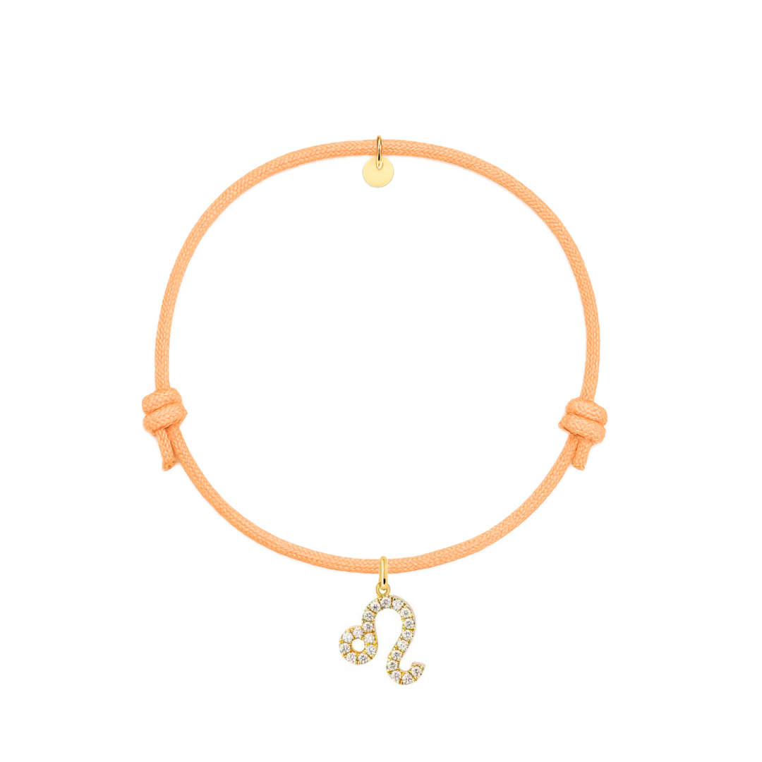 bracciale con cordino apricot e ciondolo dorato con zirconi