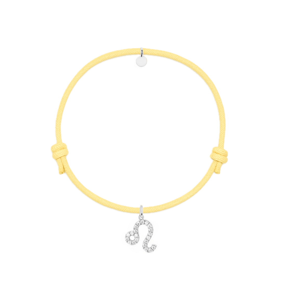 bracciale con cordino giallo e ciondoli in argento e zirconi