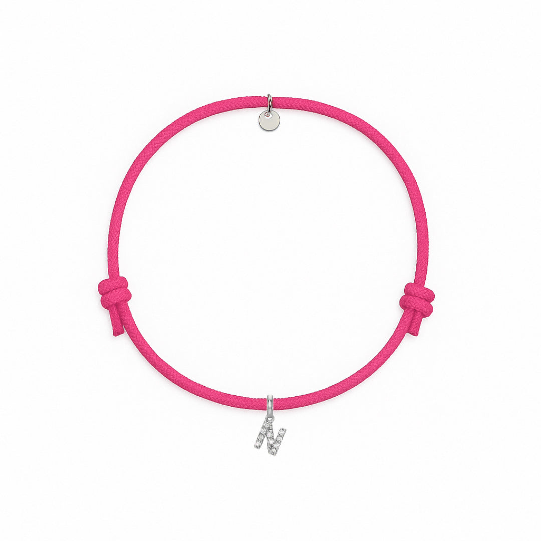 bracciale con cordino fucsia con iniziale N argento