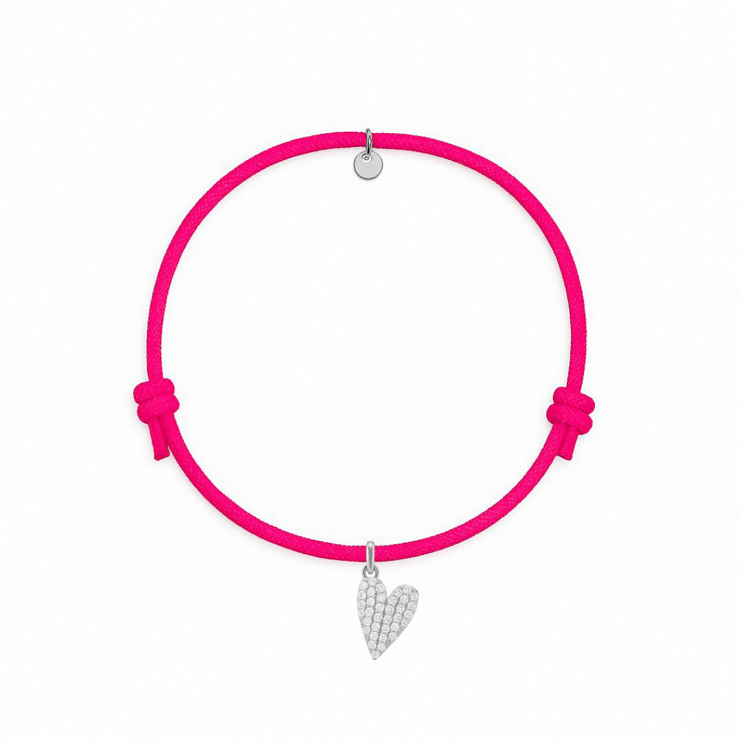 bracciale in cordino fucsia con ciondolo a cuore in pavè di diamanti