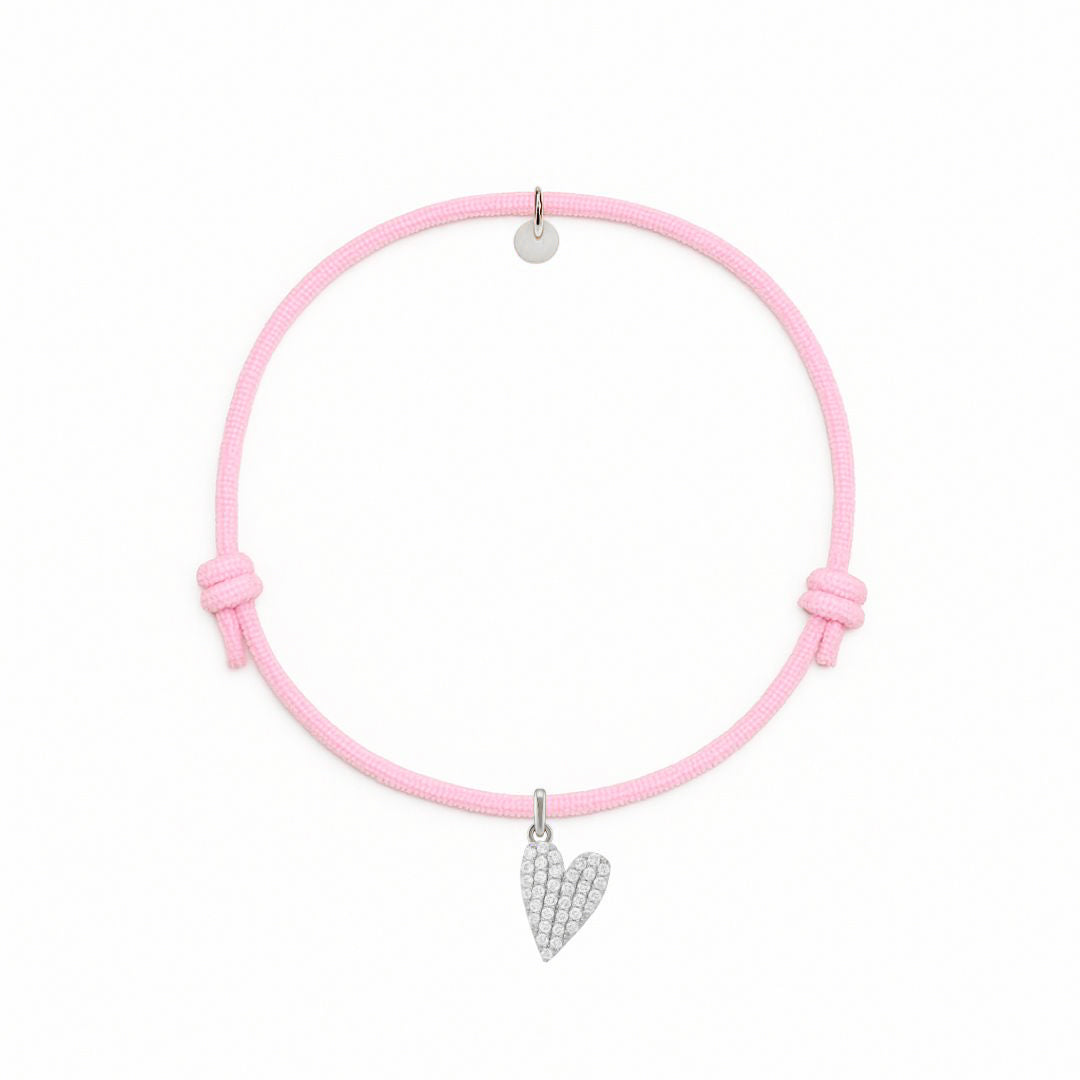 bracciale in cordino rosa con ciondolo a cuore in pavè di diamanti