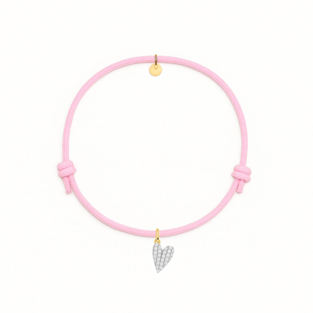 bracciale cordino rosa con ciondolo cuore pavé di zirconi in argento