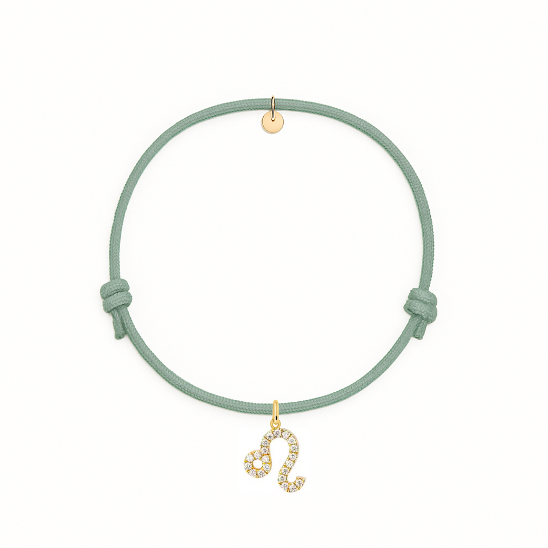 bracciale con cordino verde salvia e ciondoli oro con zirconi