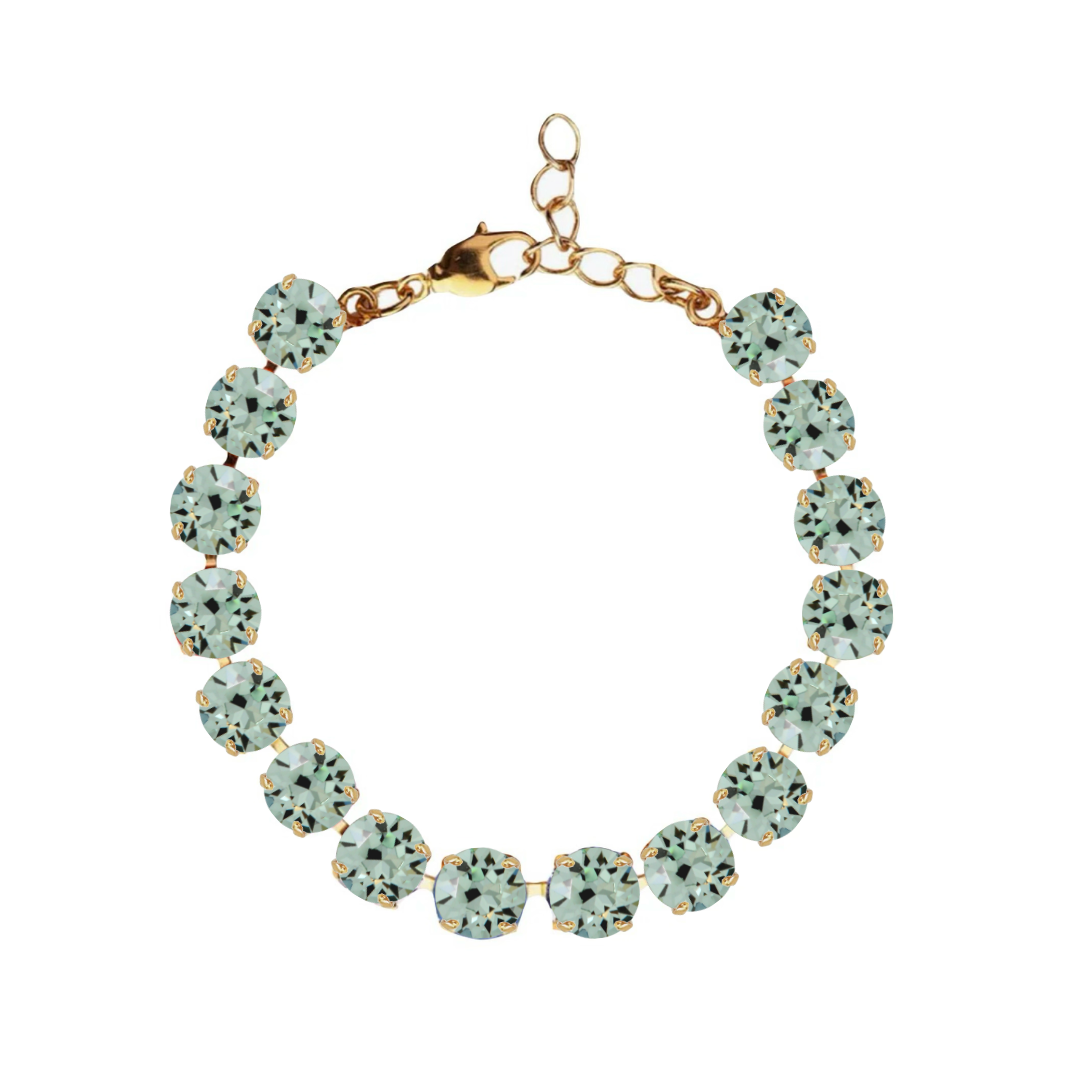 bracciale con cristalli verde e rifiniture oro