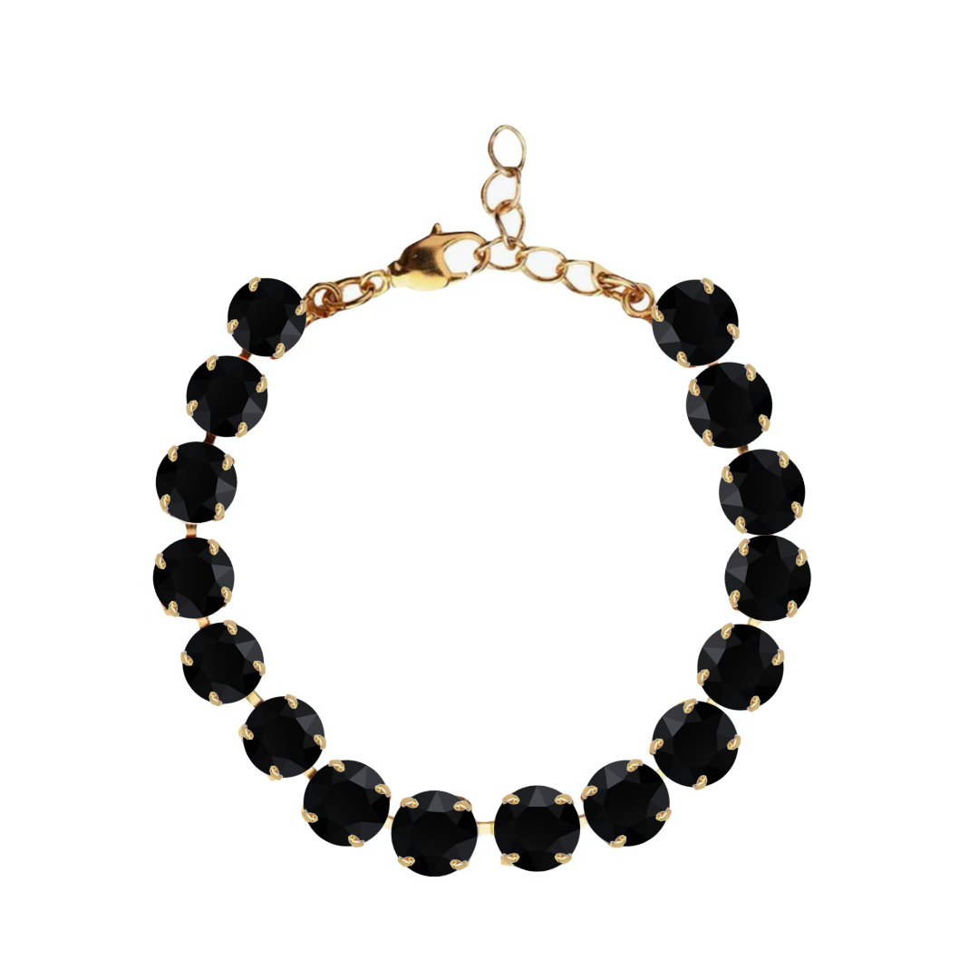 bracciale con cristallo nero e dettagli in oro