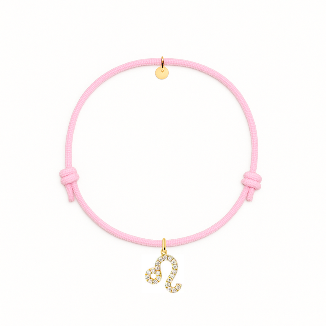 bracciale con cordino rosa e ciondolo dorato con zirconi