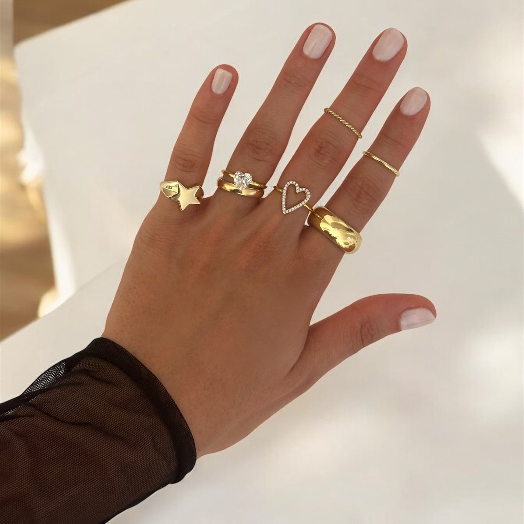 anelli indossati stella, solitario, fedine, cuore swarovski