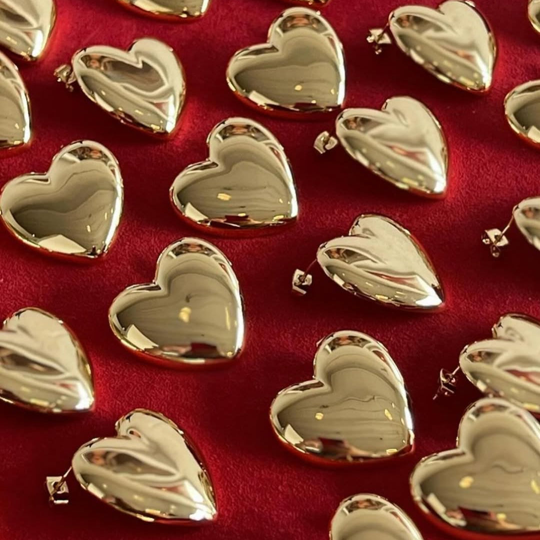 orecchini a forma di cuore bombati color oro