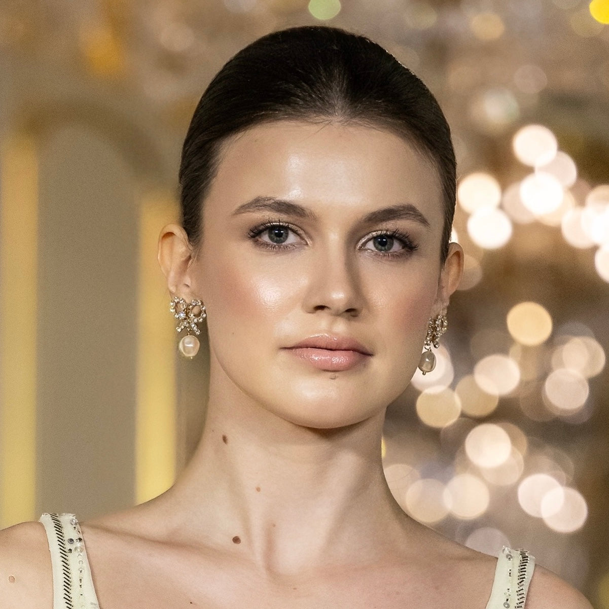 orecchini a fiocchetto con perla in Swarovski argento