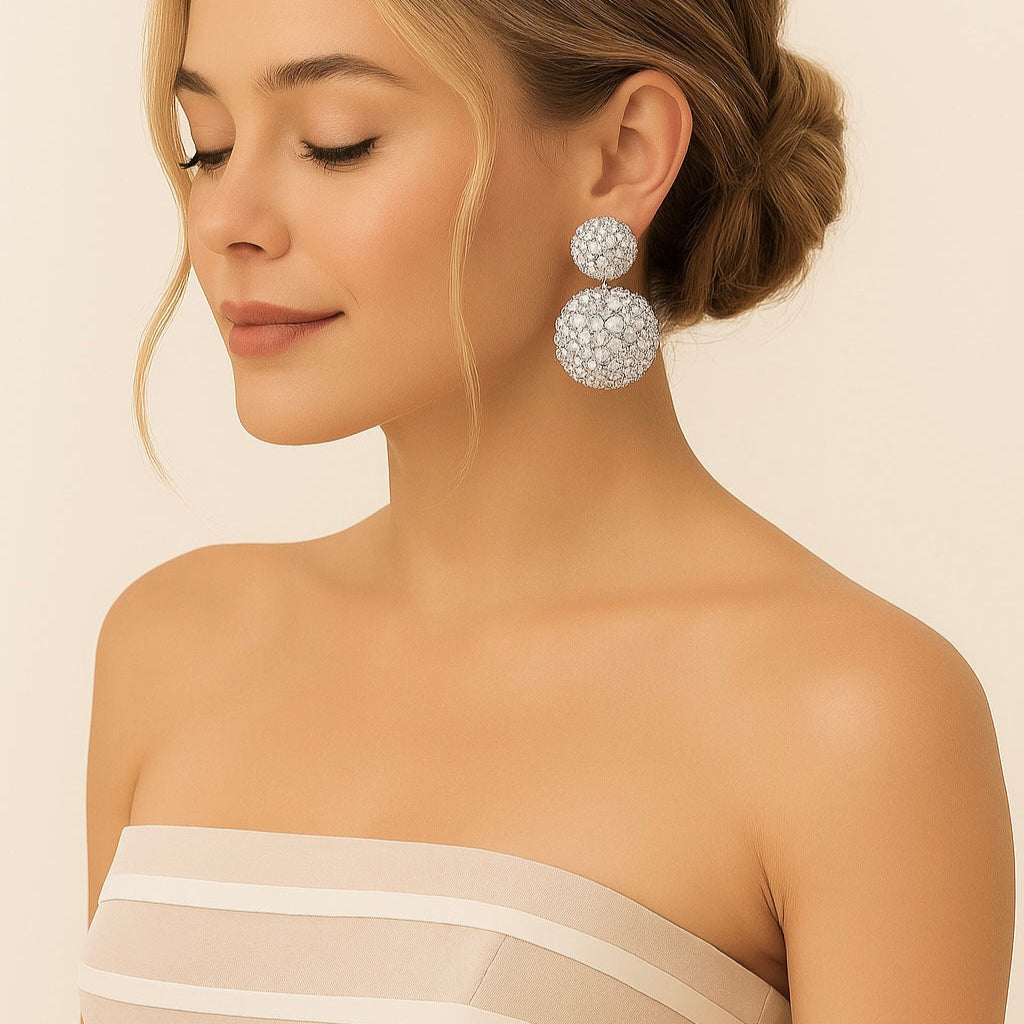 orecchini swarovski bottone pendente indossati