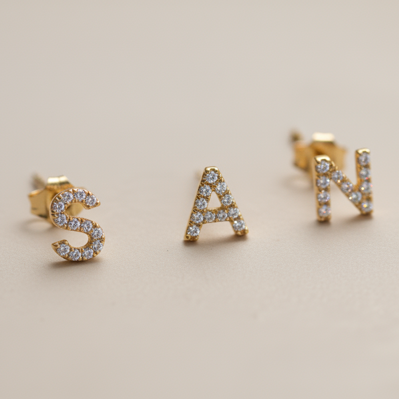 orecchini iniziali diamanti
