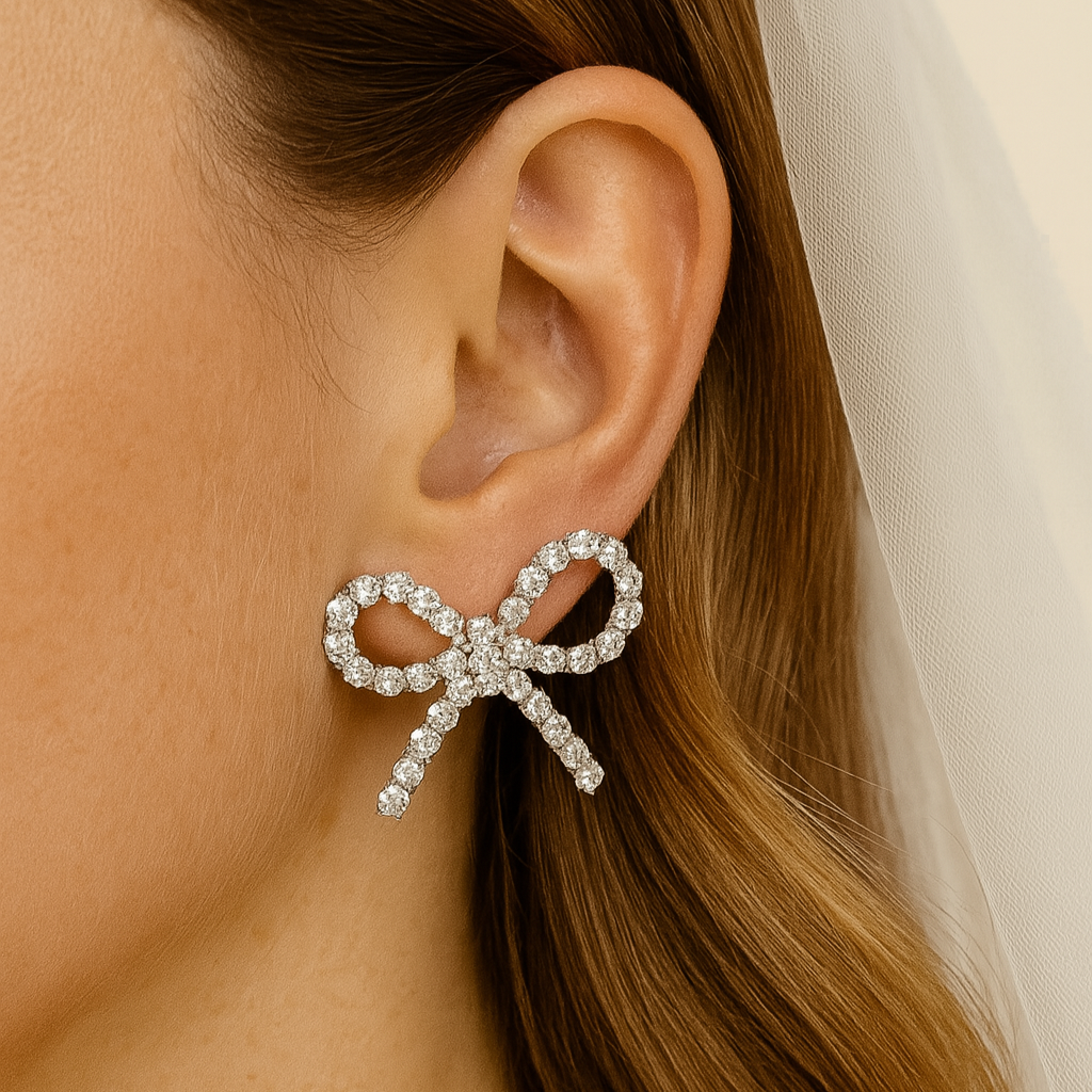 orecchini fiocco swarovski indossati