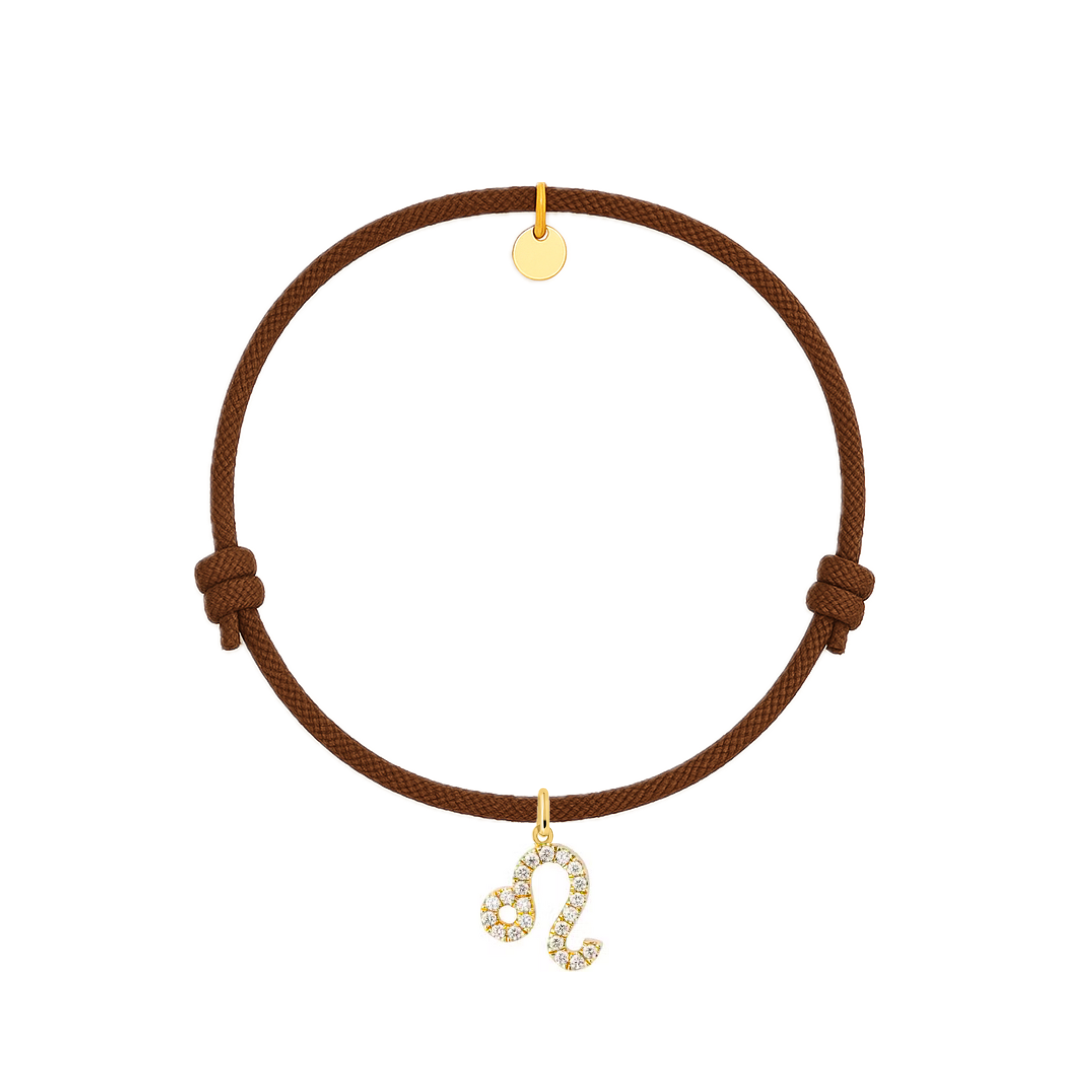 bracciale con cordino marrone e ciondolo dorato e zirconi