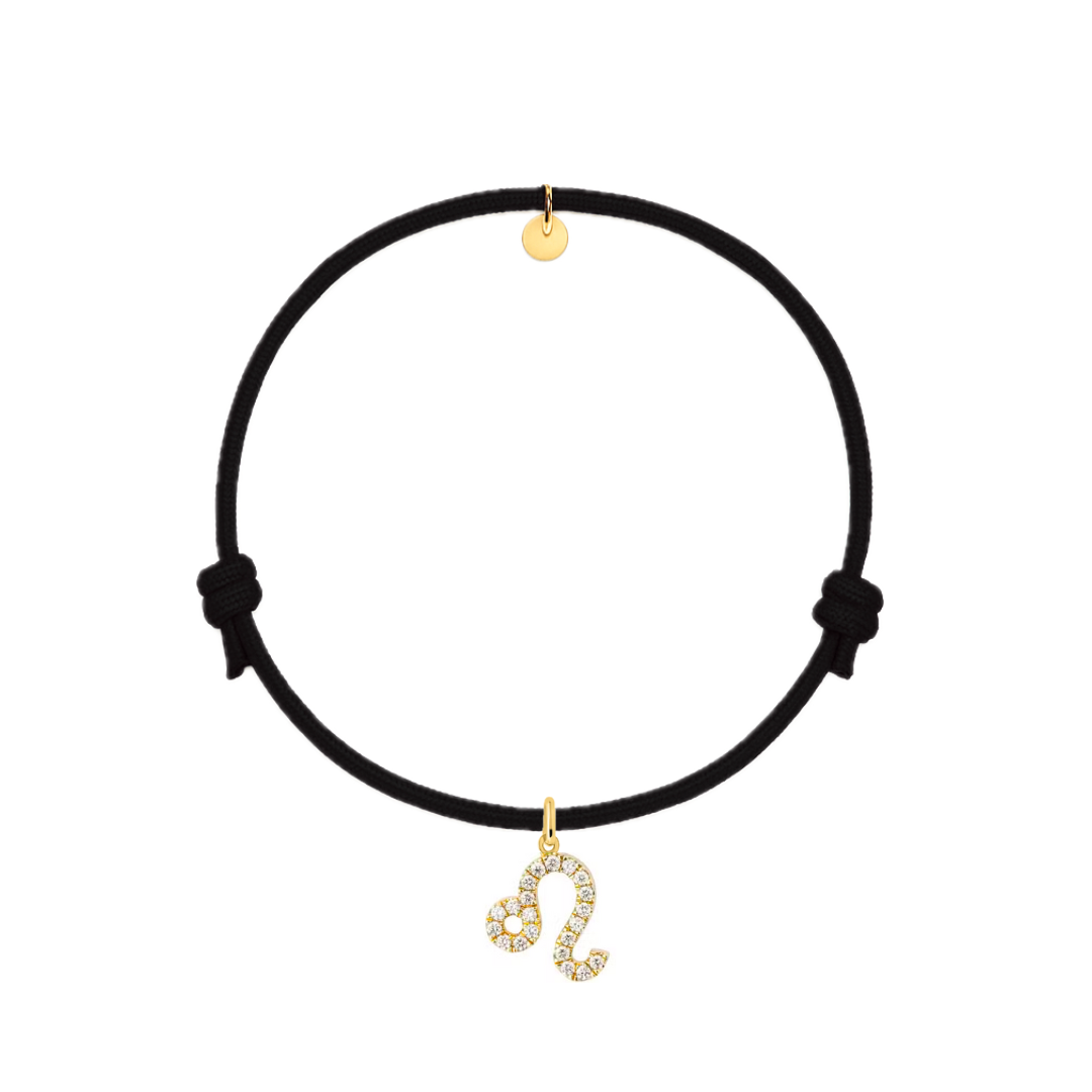 bracciale con cordino nero e ciondolo leone dorato con zirconi.