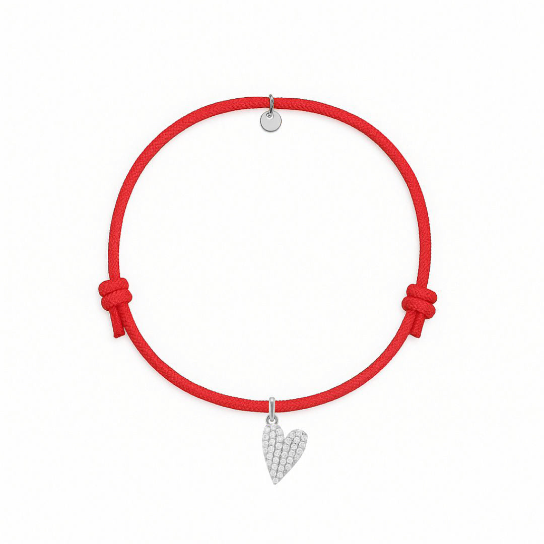 bracciale in cordino rosso con ciondolo a cuore in pavè di diamanti