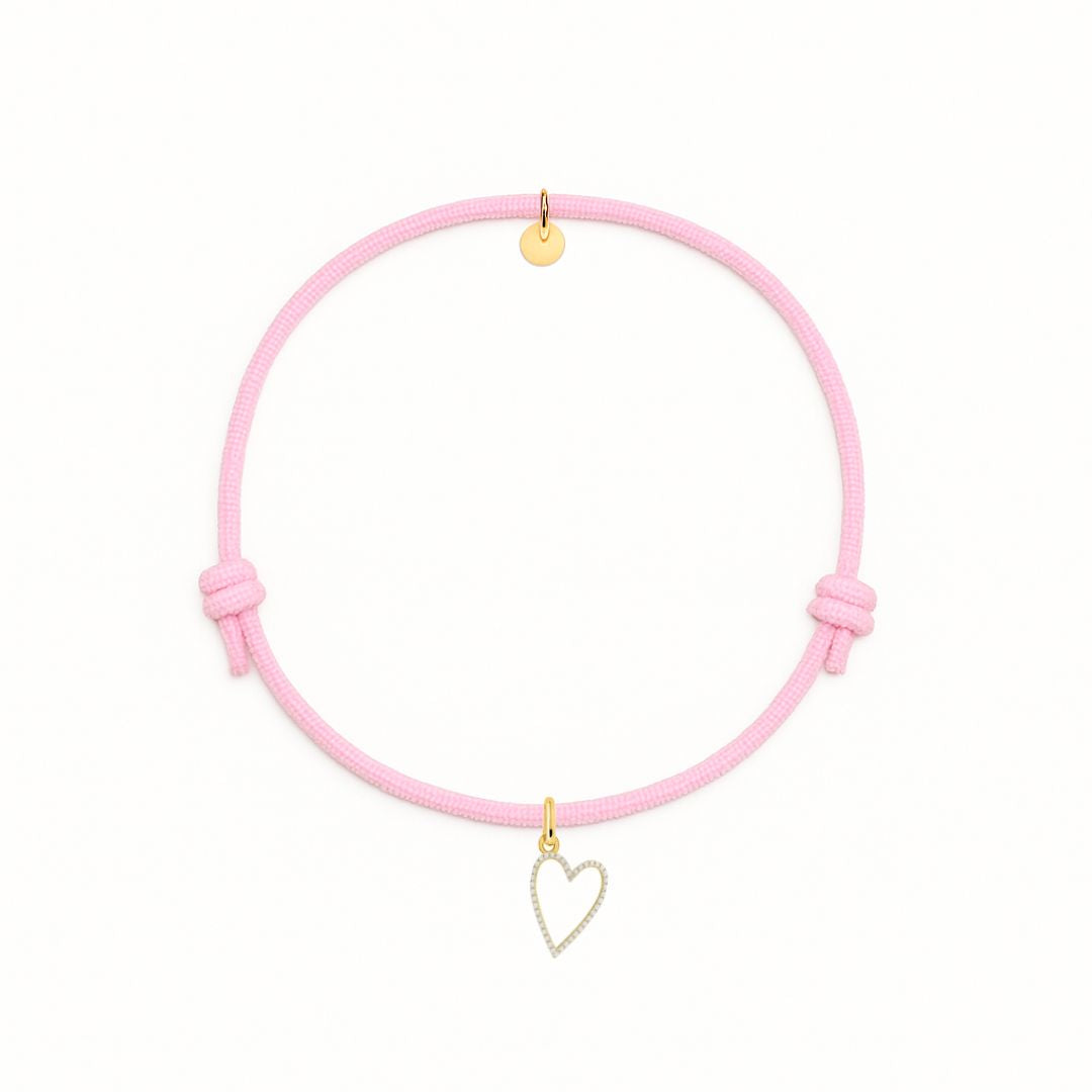 bracciale cordino rosa con ciondolo cuore sagoma oro in argento 925