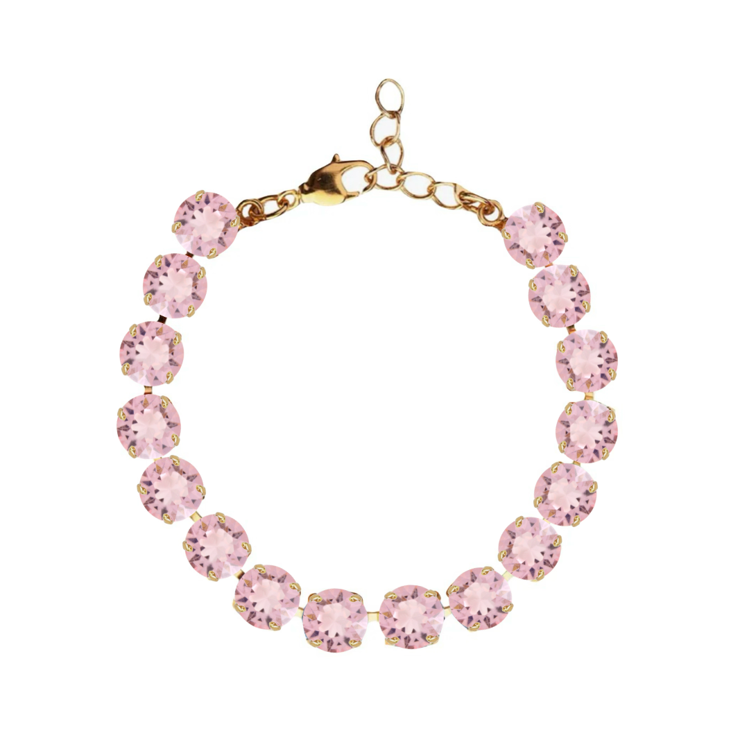 bracciale con cristalli rosa e dettagli oro