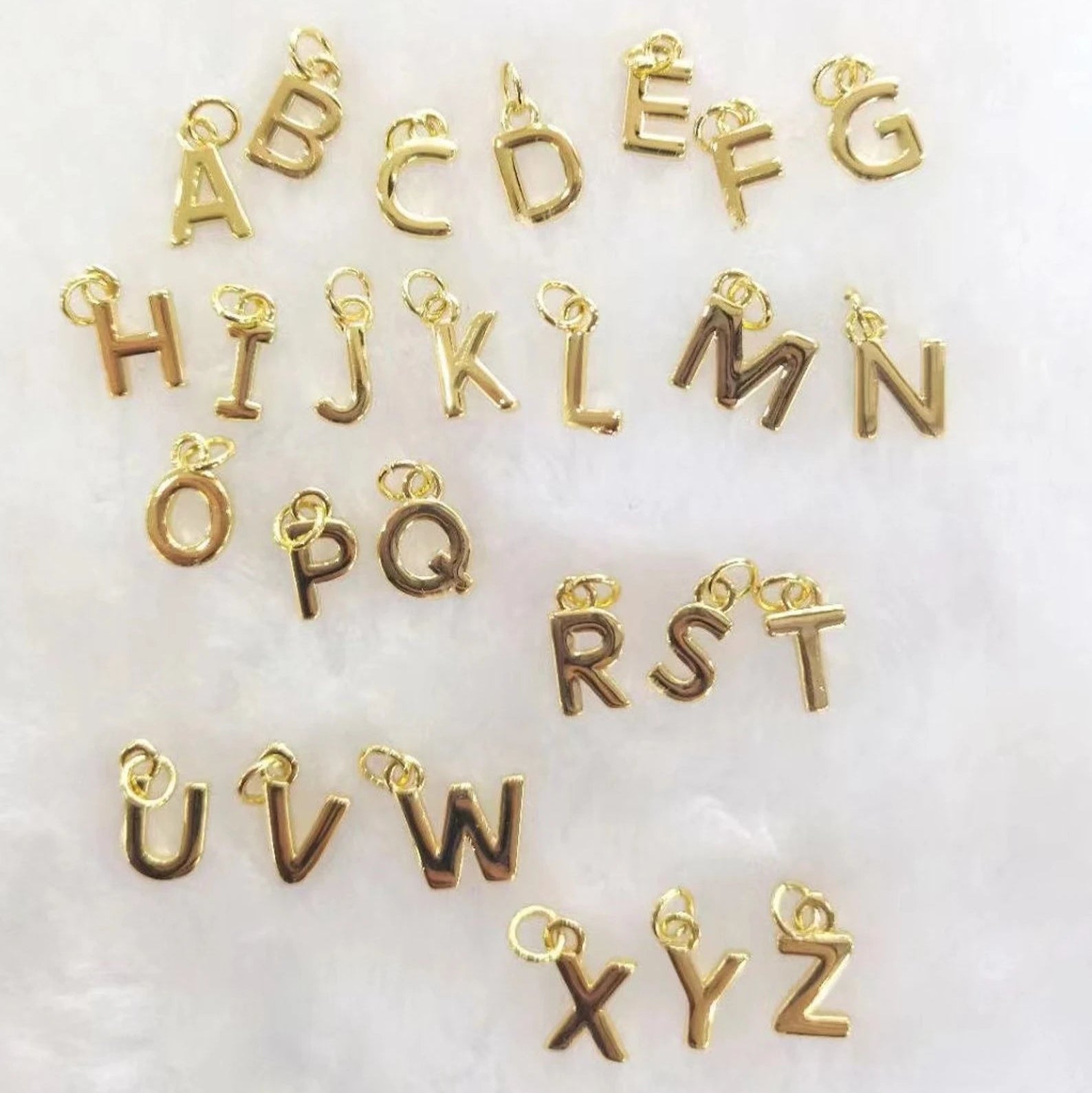 ciondolo lettera dorato in argento 925