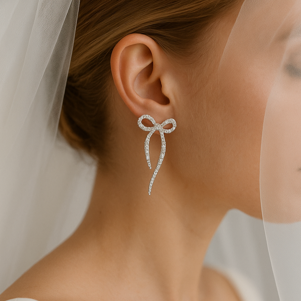 orecchini fiocco da sposa indossati con swarovski