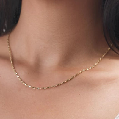 catenina oro maglia dorica indossata