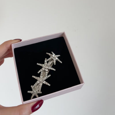 fermaglio per capelli luminoso con stelle di dimensioni varie in swarovski 