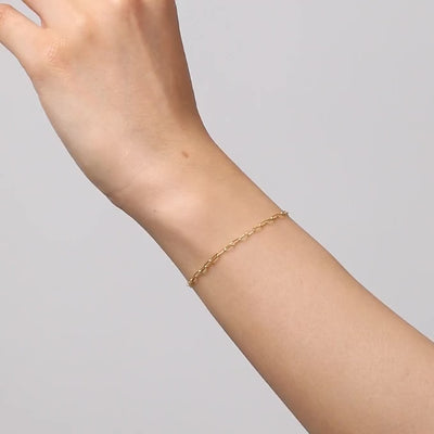 bracciale paperclip oro indossato