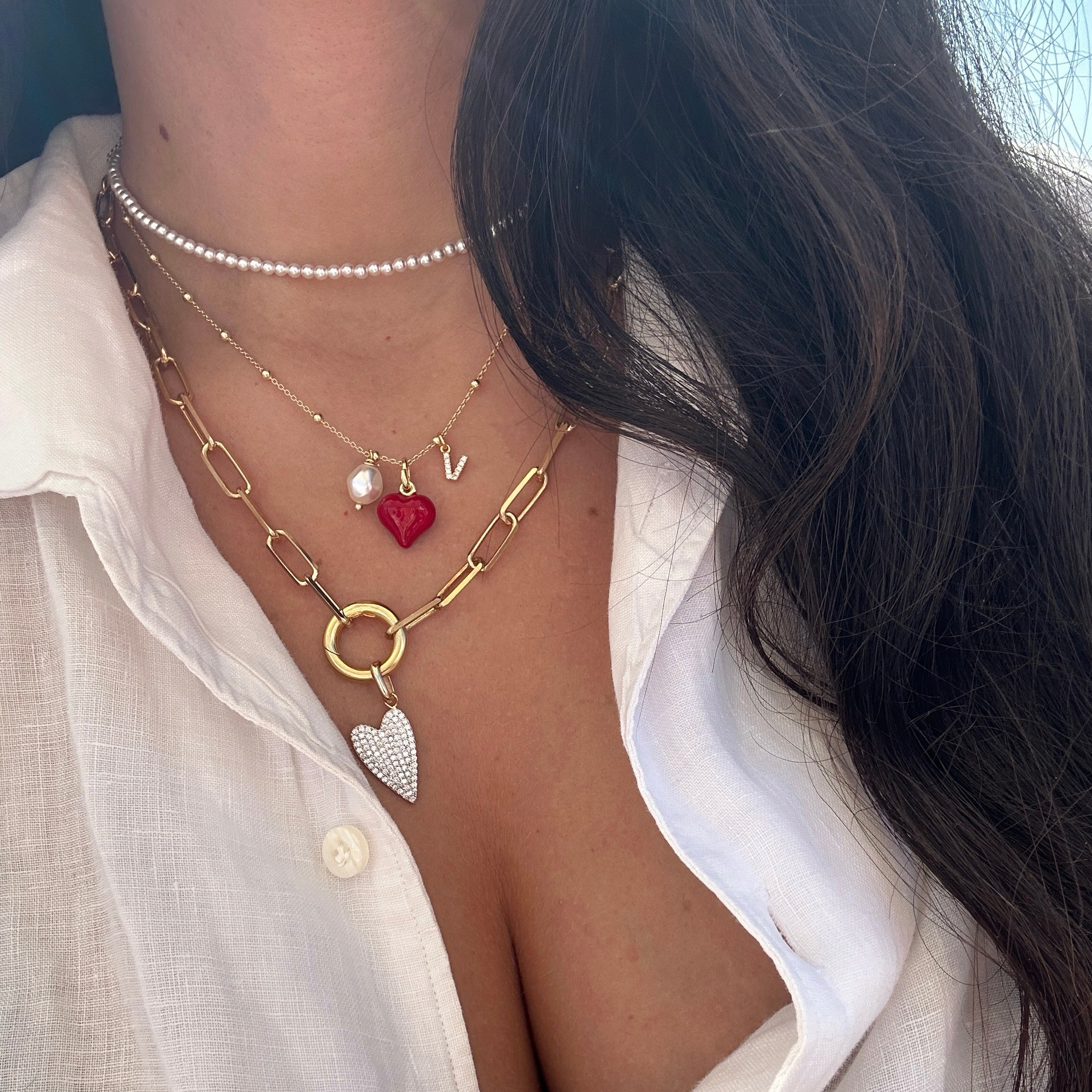 Set collane: choker perline, rosario con ciondolo cuore smaltato e moschettone lovelock con ciondolo bonheur